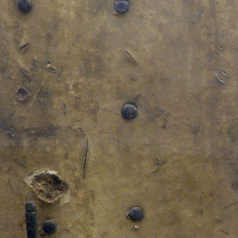 Боевые повреждения таргетты №184 из музея Civico Medievale, Bologna